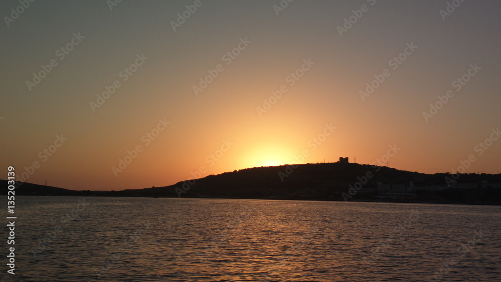 Sunset over Ghadira bay