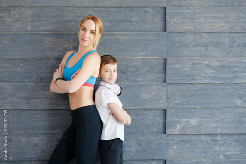 Fitness mother with her 9 years old son photo