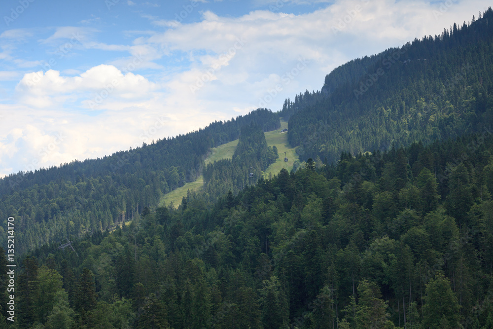 Typical landscape in southern Germany, with towering peaks and verdant valleys.