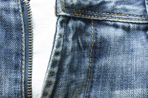 Isolated close up to jeans zipper on white background