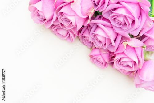 Valentines day violet fresh roses border close up top view flat ly scene