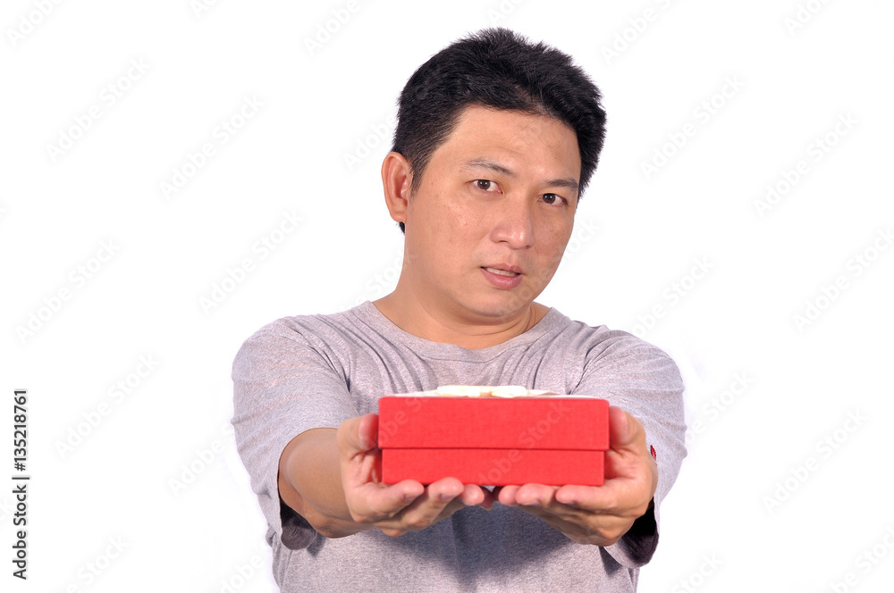Asian middle man 42 years old with red gift box, human behavior. Asian middle man 42 years old with red gift box, human behavior.