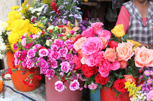 Fototapeta Naklejka Na Ścianę i Meble -  Colorful Flowers at Outdoor Market in Peru