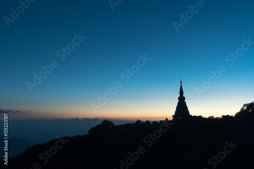 Silhouette blue sky with pagoda in Thailand © Natapol