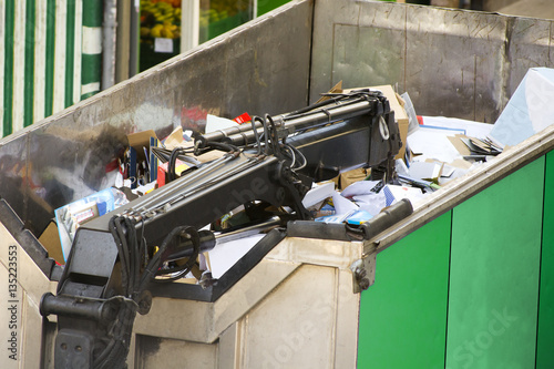 cardboard for recicling in truck of utility workers photo