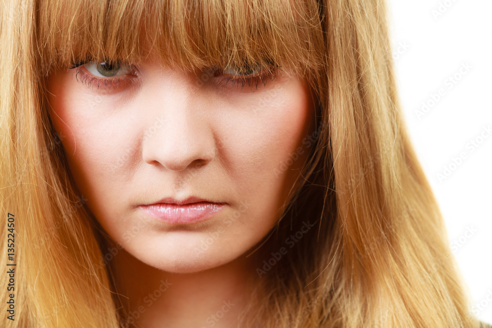 Angry looking woman, face covered in fringe Angry looking woman, face covered in fringe