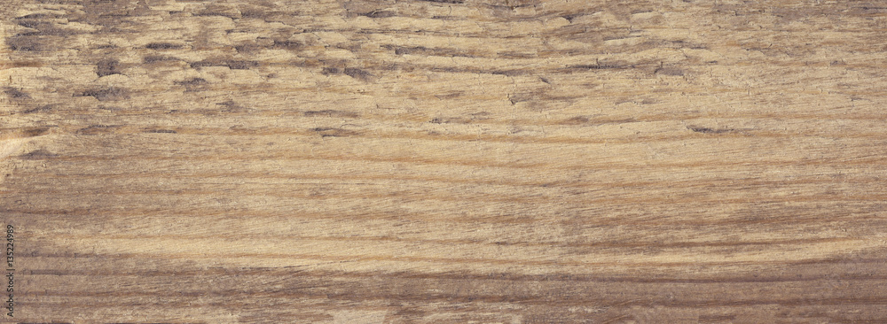 Brown scratched wood texture with natural pattern. Wooden background Brown scratched wood texture with natural pattern. Wooden background