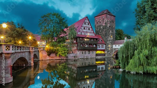 Maxbrucke bridge and Henkerturm tower - part of western medieval fortifications of Nuremberg (static image with animated sky and water)
