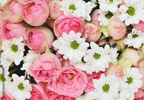 Closeup of pink roses and w...