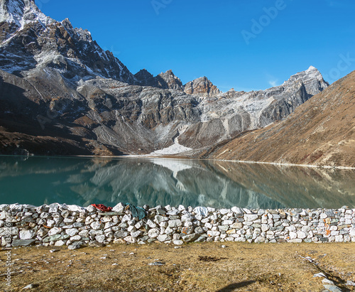 Beautiful morning view from the village of Gokyo on the lake Dudh Pokhari - Nepal, Himalayas photo