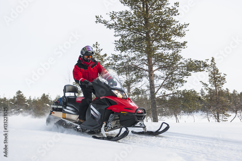 Snowmobile rider, Lapland, Finland