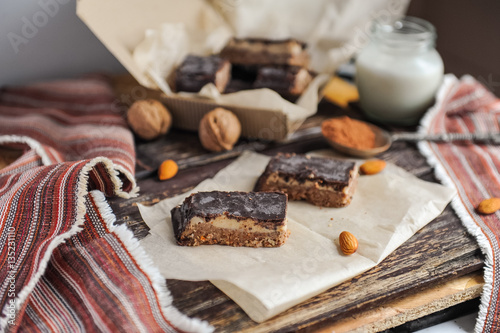 Homemade healthy snack sweets - energy nut bars. Sugar-free, gluten-free, without baking. Selective focus