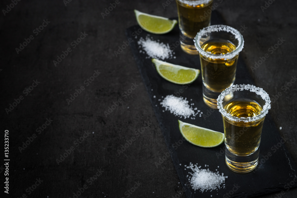 Tequila shot with lime and sea salt Tequila shot with lime and sea salt