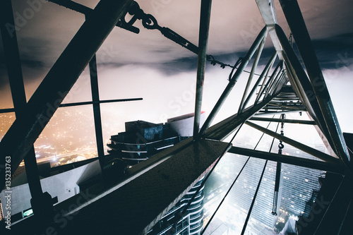 Elevated view of misty city from crane