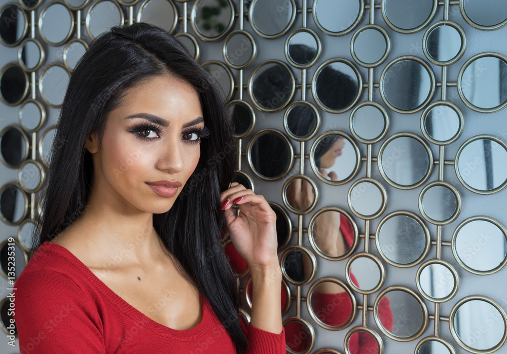 Beautiful woman with dark exotic features StockFoto Adobe Stock