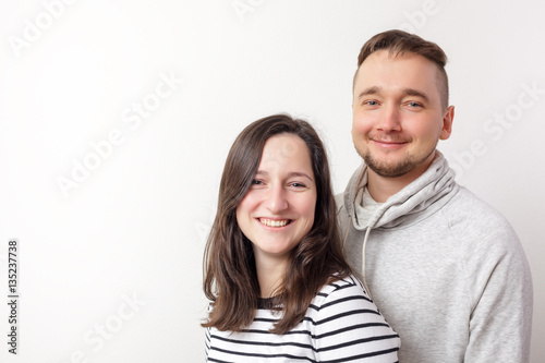 Young couple in love having fun and laughing. Confidence and happiness