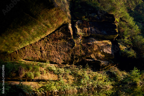 Mossed rocks in a beautiful sunset light
