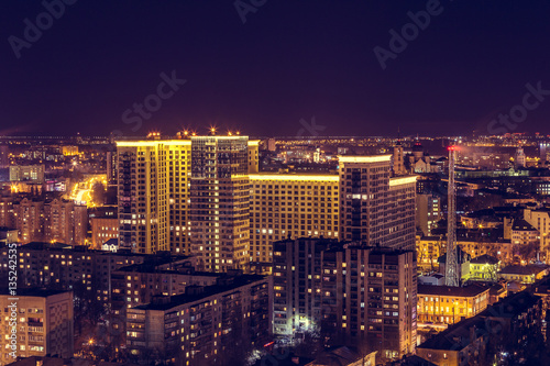 Voronezh downtown. Night cityscape from rooftop. Modern houses  hotels  streets