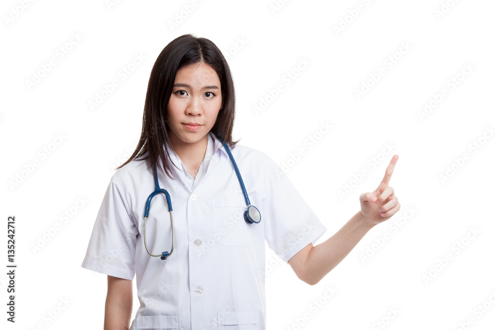Asian young female doctor point to blank space. Asian young female doctor point to blank space.