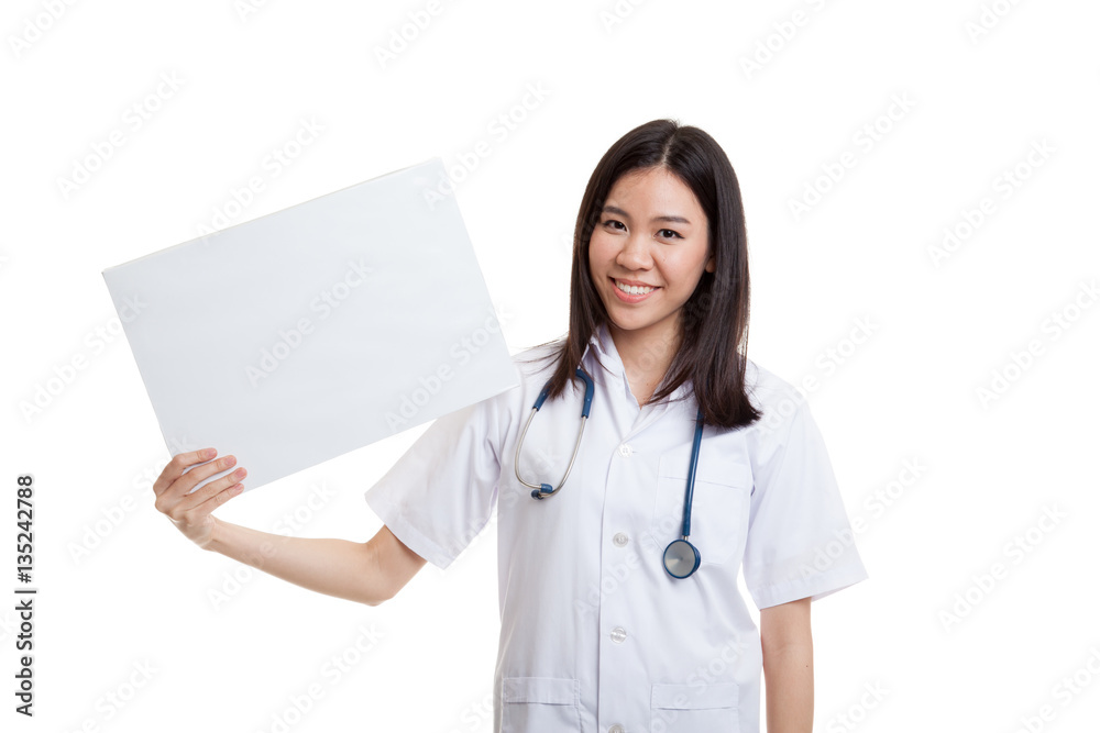 Young Asian female doctor show a blank sign. Young Asian female doctor show a blank sign.