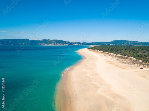 Aerial View Empty Sandy Beach with Small Waves © Discovod