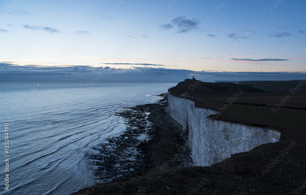 White Cliffs and Lighthouse at Dusk