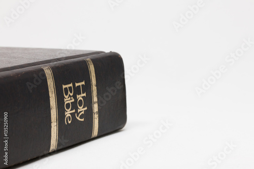 Close up of Old Holy Bible on table