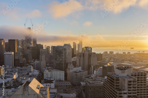 Sunrise morning fog in the towers of downtown San Francisco.
