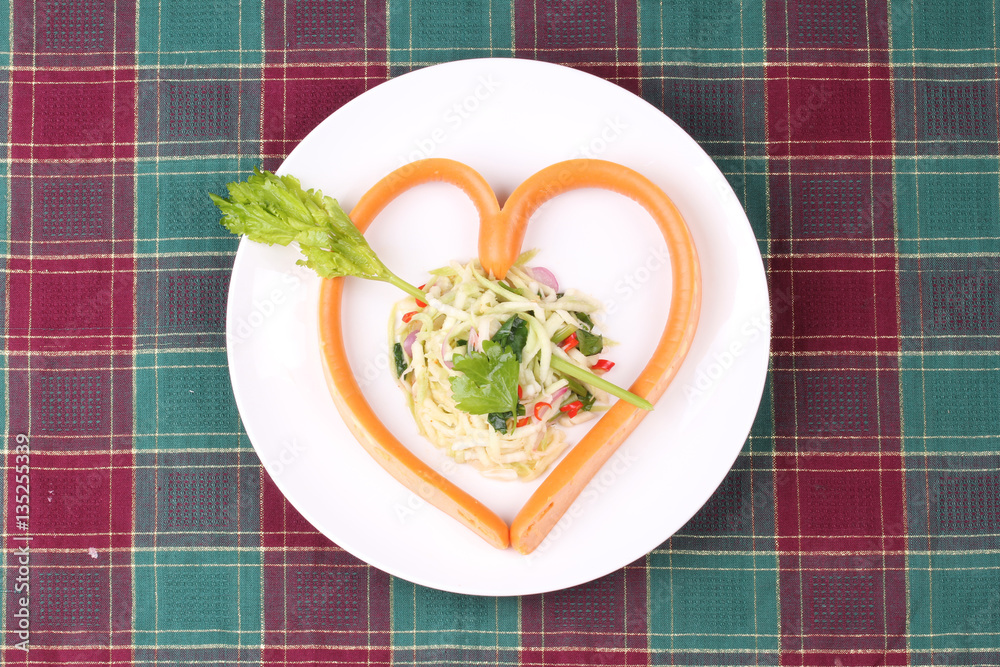 Sausage cheese in heart style with spicy green mango salad. Sausage cheese in heart style with spicy green mango salad.
