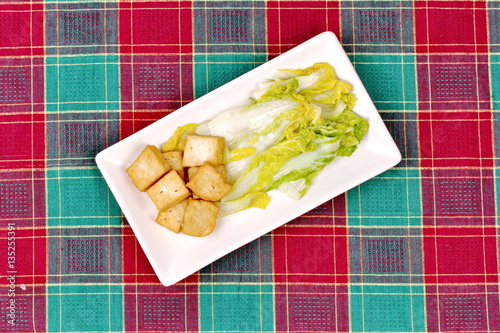 Fototapeta Naklejka Na Ścianę i Meble -  Spicy mixed vegetable salad with sliced Thai white pork sausage