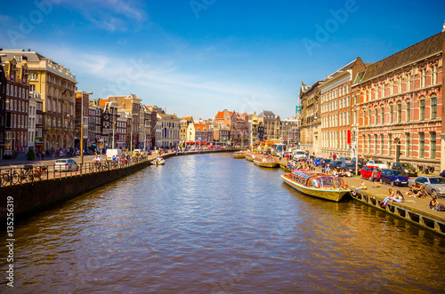 Traditional old buildings and and boats in Amsterdam  Netherland