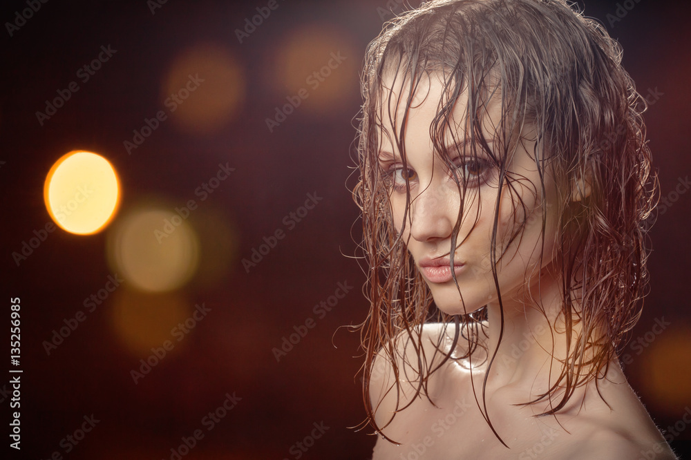 beautiful woman with wet hair looking at camera beautiful woman with wet hair looking at camera