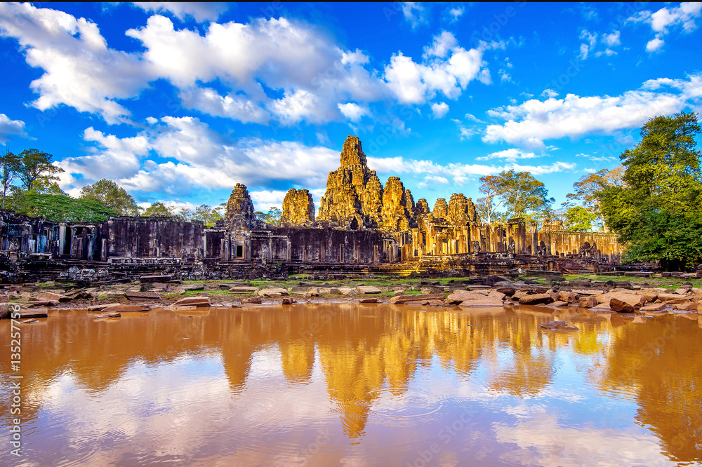 Ancient stone faces of Bayon temple, Angkor Wat, Siem reap, Cambodia. Ancient stone faces of Bayon temple, Angkor Wat, Siem reap, Cambodia.