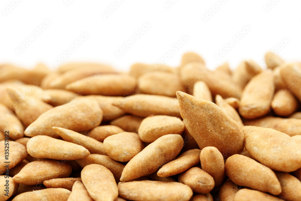 roasted sunflower seeds on white background roasted sunflower seeds on white background