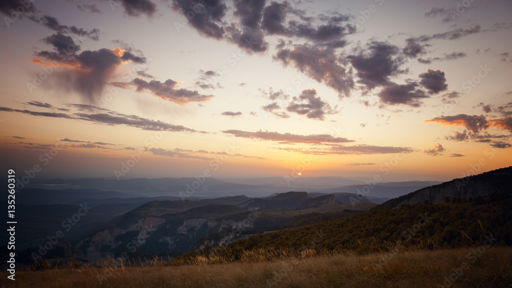 Sunrise over the mountains and the forest at dawn Sunrise over the mountains and the forest at dawn