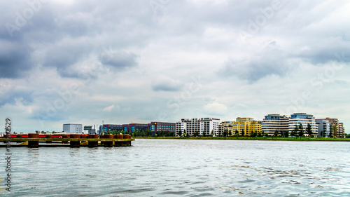 View of Modern Office Buildings along the shors of the Harbor named Het IJ in Amsterdam