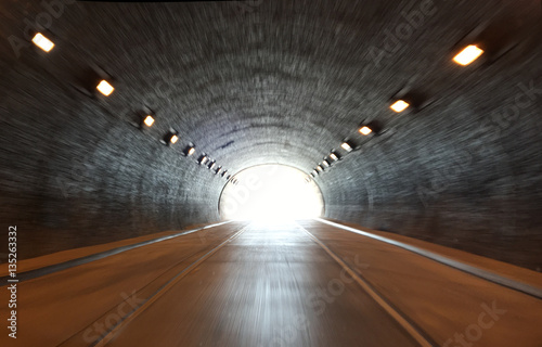 Fototapeta defocused photo on light at the end of tunnel