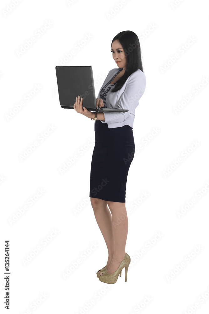 Beautiful asian business woman holding laptop while typing