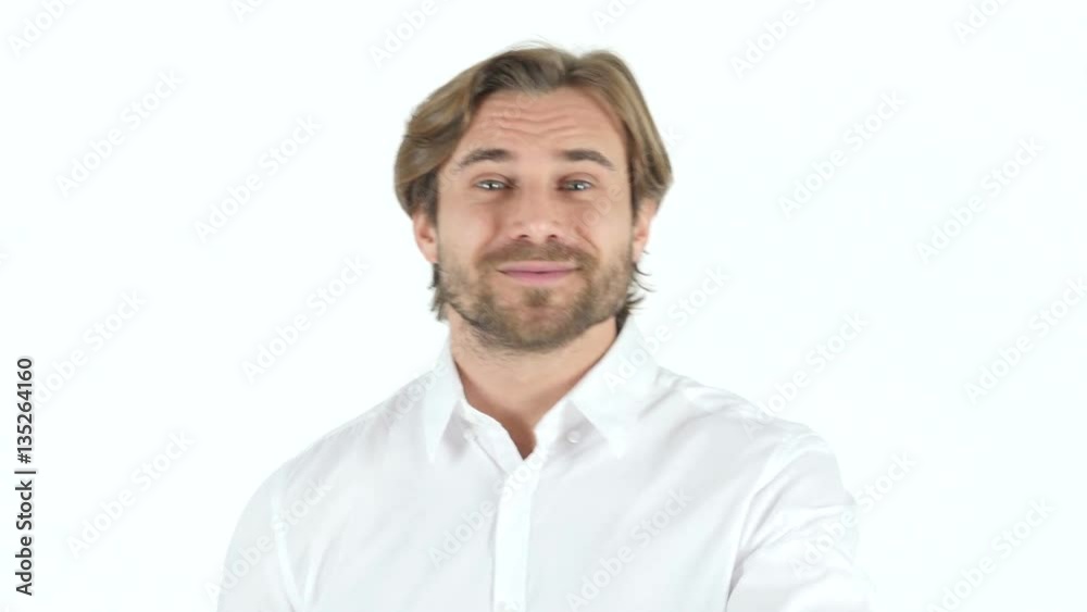 Flying Kiss by Young Man with Curly Hairs, white Background Flying Kiss by Young Man with Curly Hairs, white Background