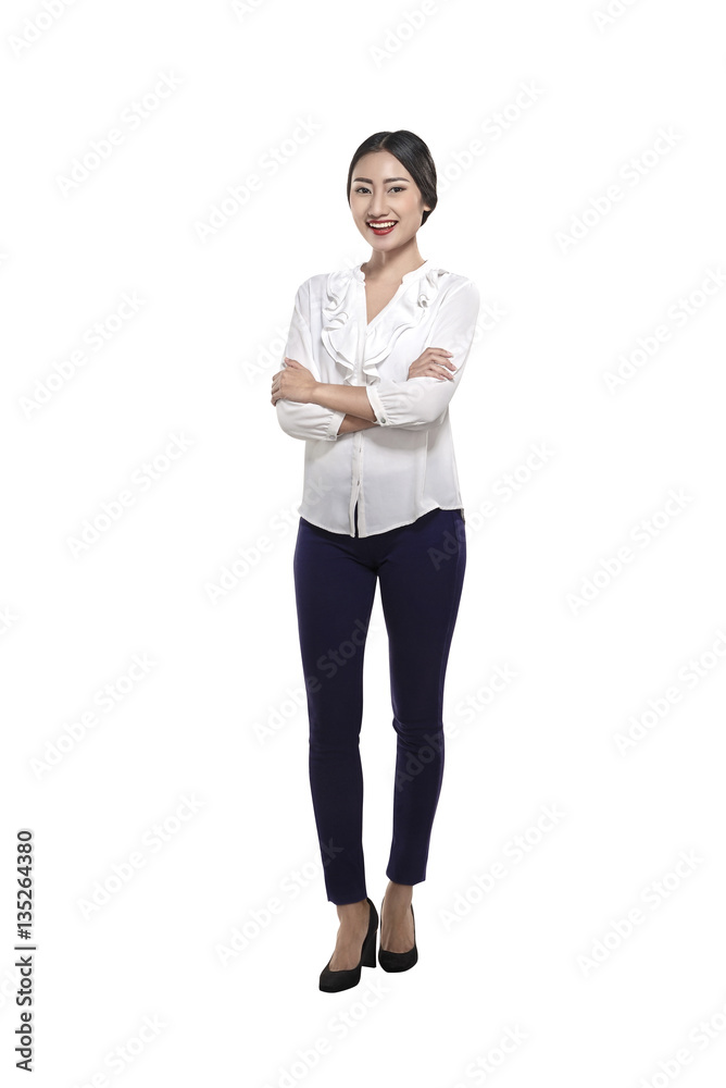 Portrait of a happy asian business woman standing with folded hands Portrait of a happy asian business woman standing with folded hands