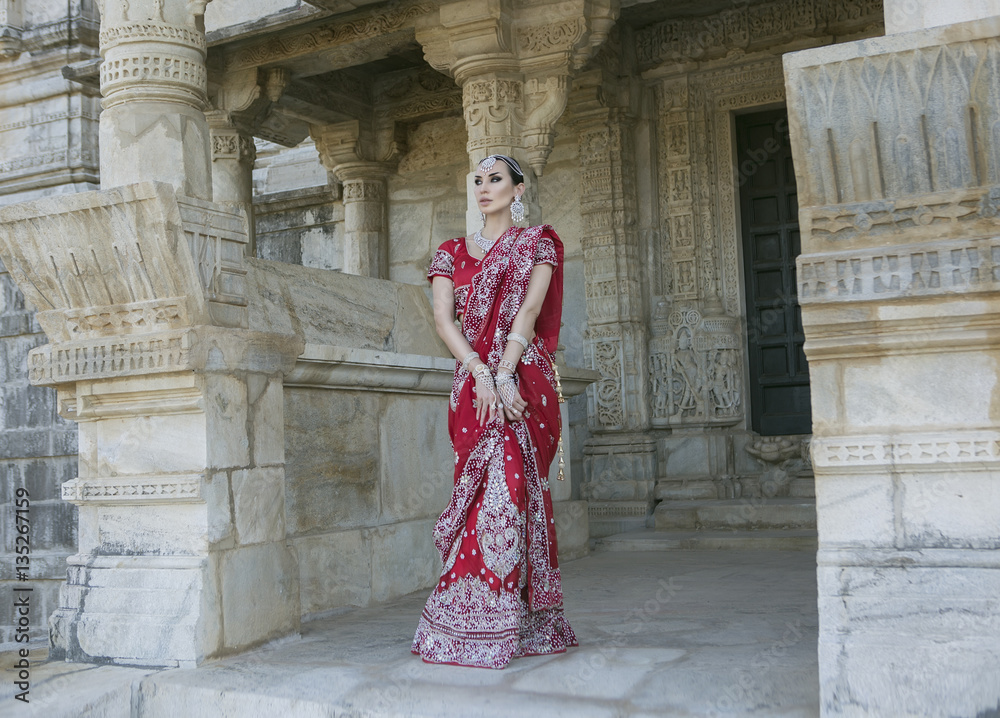 Beautiful Maharani. Young Indian Woman in Red bridal Sari clothi