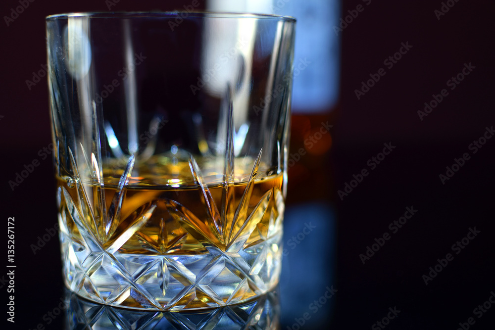 Close up of Bourbon whiskey glass. Close up of Bourbon whiskey glass.