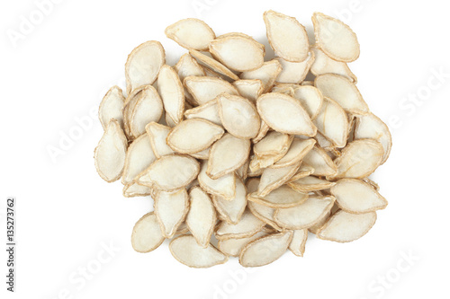 Pumpkin seeds isolated on white background.