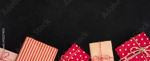 Gift boxes, border design, on blackboard background