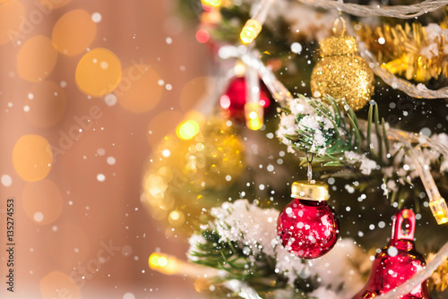Shiny and glittering decorative ornaments on Christmas tree