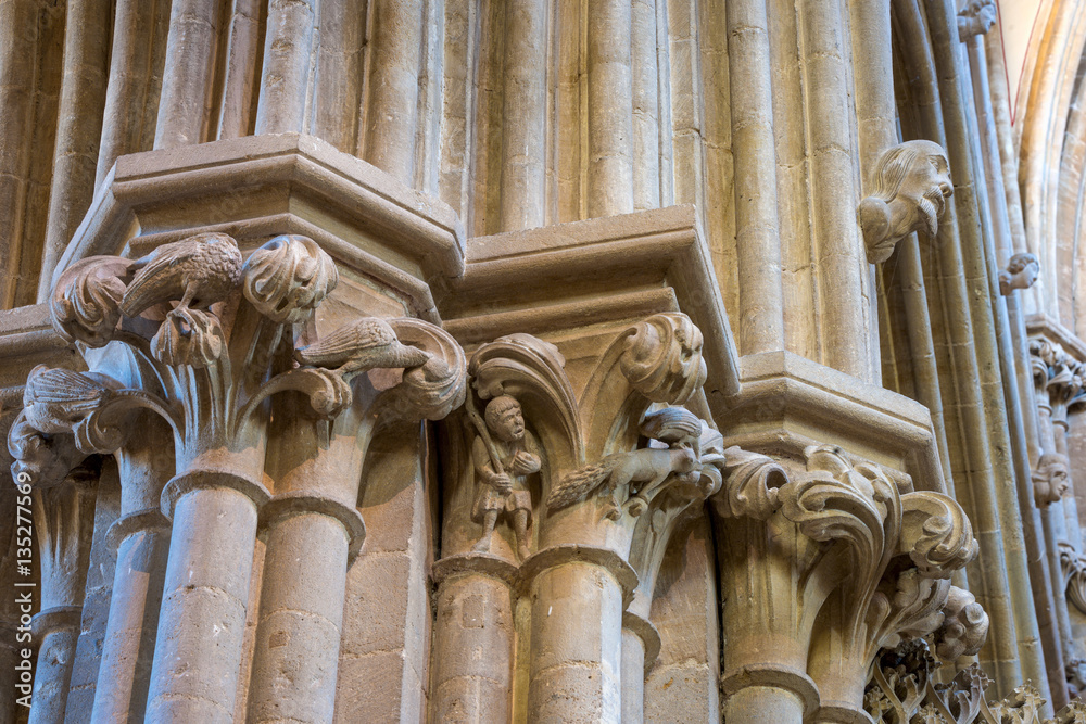Wells, United Kingdom - August 6, 2016: Column capital carvings inside Well cathedral