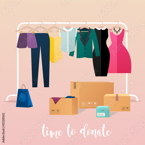 Clothes donation. Girl makes clothes donations. Boxes full of cl