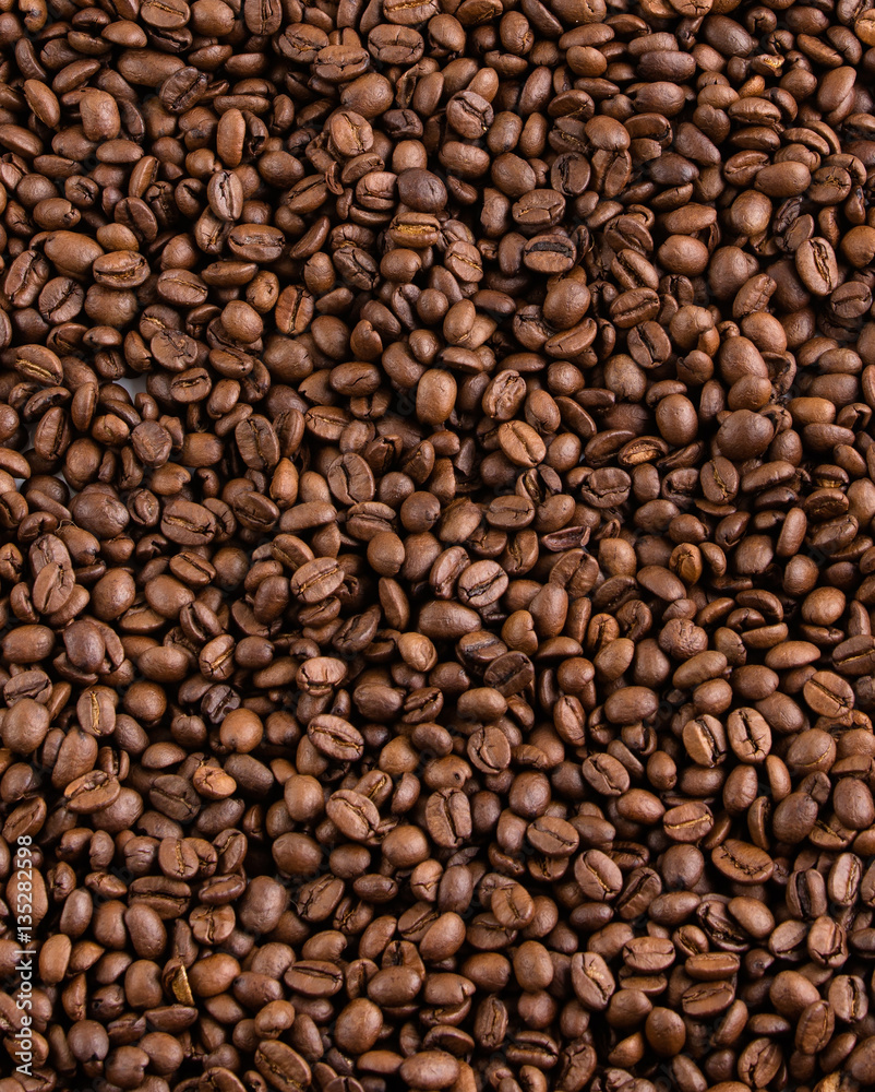 Brown coffee beans, close-up of coffee beans for background and texture Brown coffee beans, close-up of coffee beans for background and texture