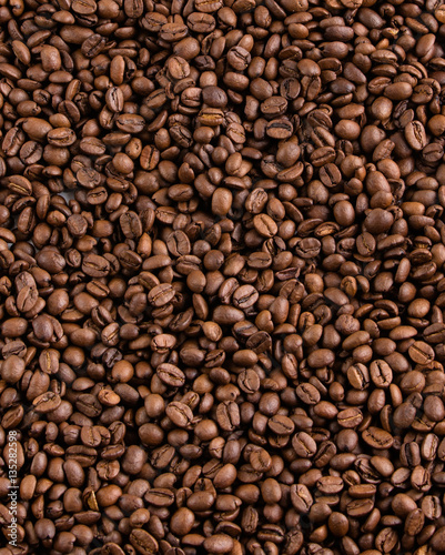Brown coffee beans  close-up of coffee beans for background and texture