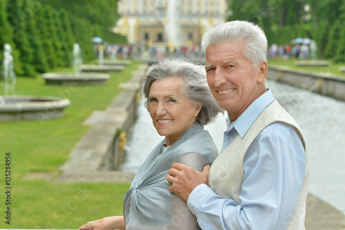 mature couple on  in summer park